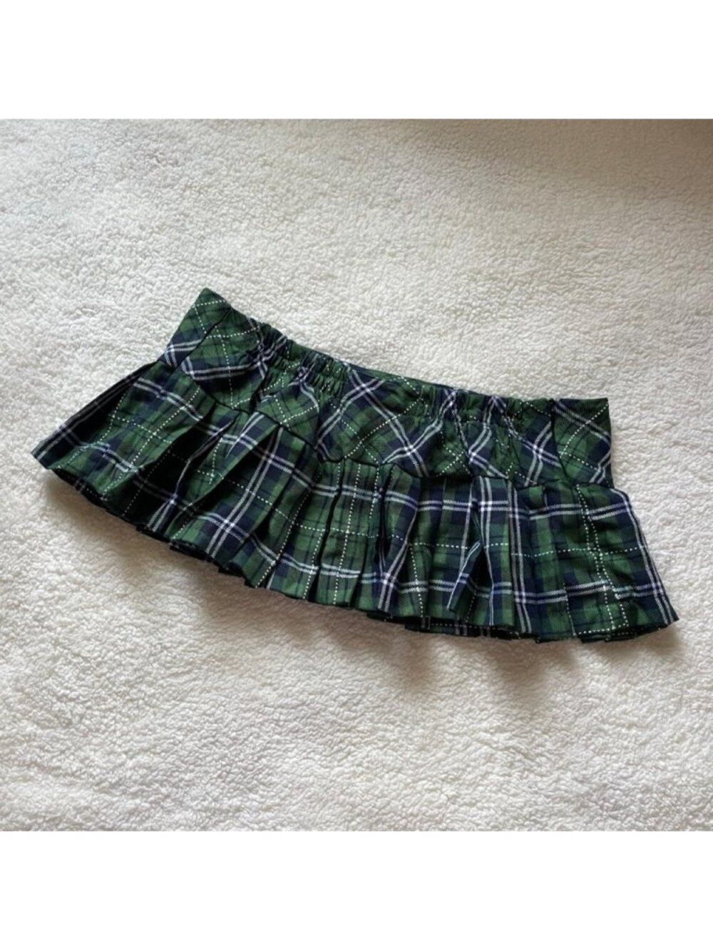 Green plaid pleated micro skirt